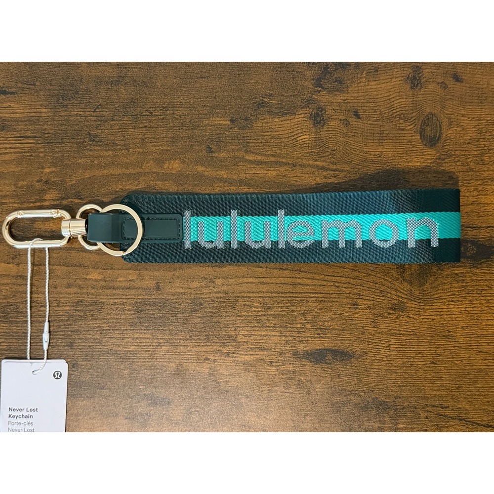 Lululemon Never Lost Keychain Green Teal Gold Hardware Logo Wristlet NWT